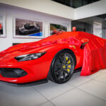 Ferrari key handover - Ferrari unveiling. Lifestyle photography Ferrari key handover - Ferrari unveiling. Lifestyle photography